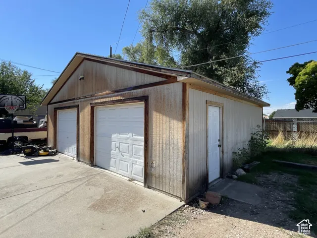 Two-car detached garage with side entry door