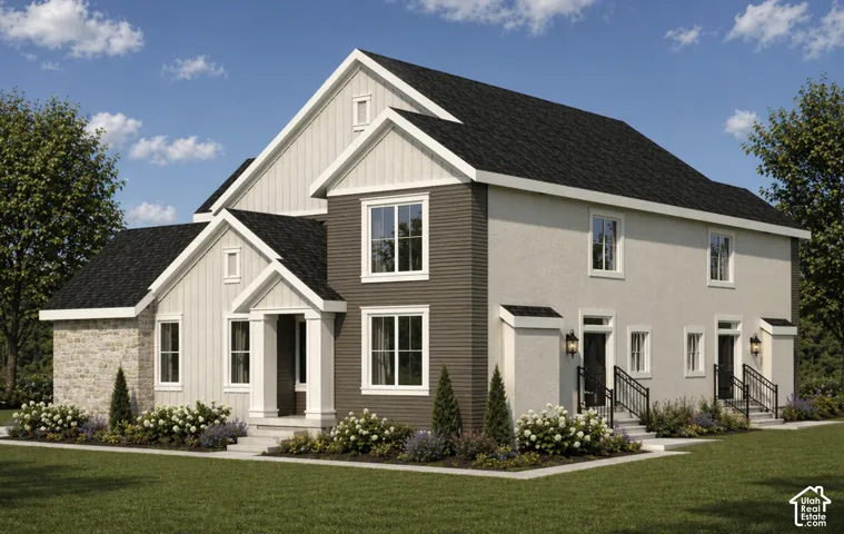 Multi-textured exterior featuring stone accents and vertical siding