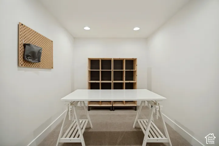 Recessed lighting illuminates a neutral color palette