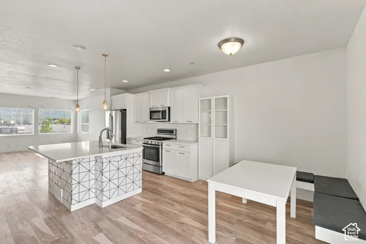 Kitchen and dining area featuring built in seating