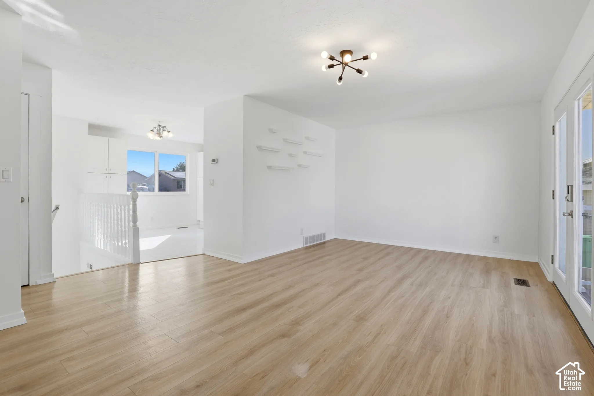 Wood-finish flooring throughout the main living space
