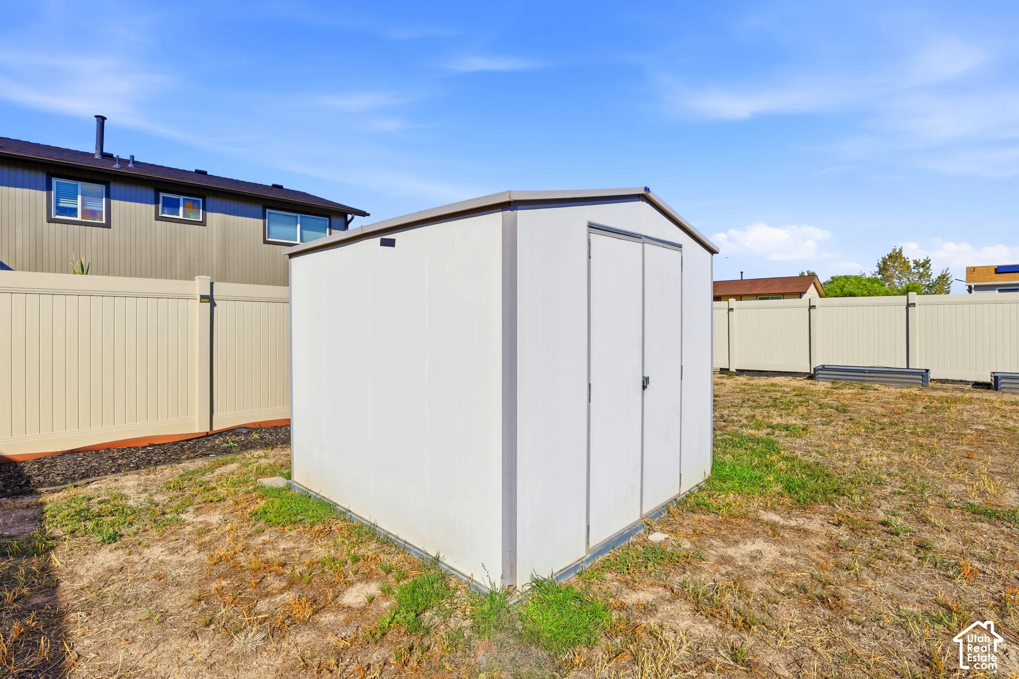 Detached storage shed with double doors