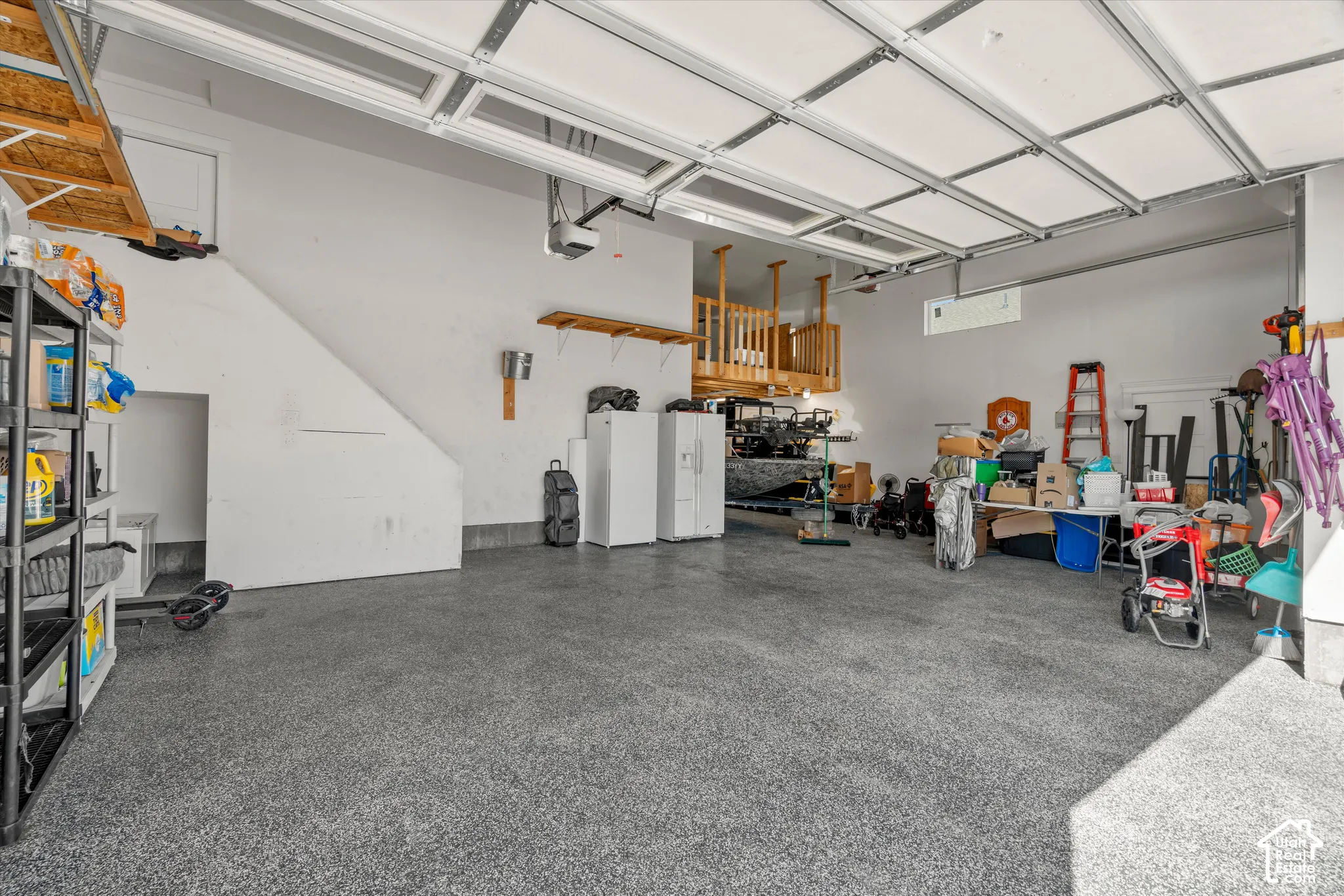 Epoxy floors, RV Boat parking, extended door height. Large extra storage overhead.