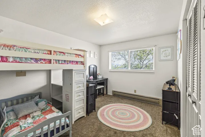 White painted walls with a textured ceiling
