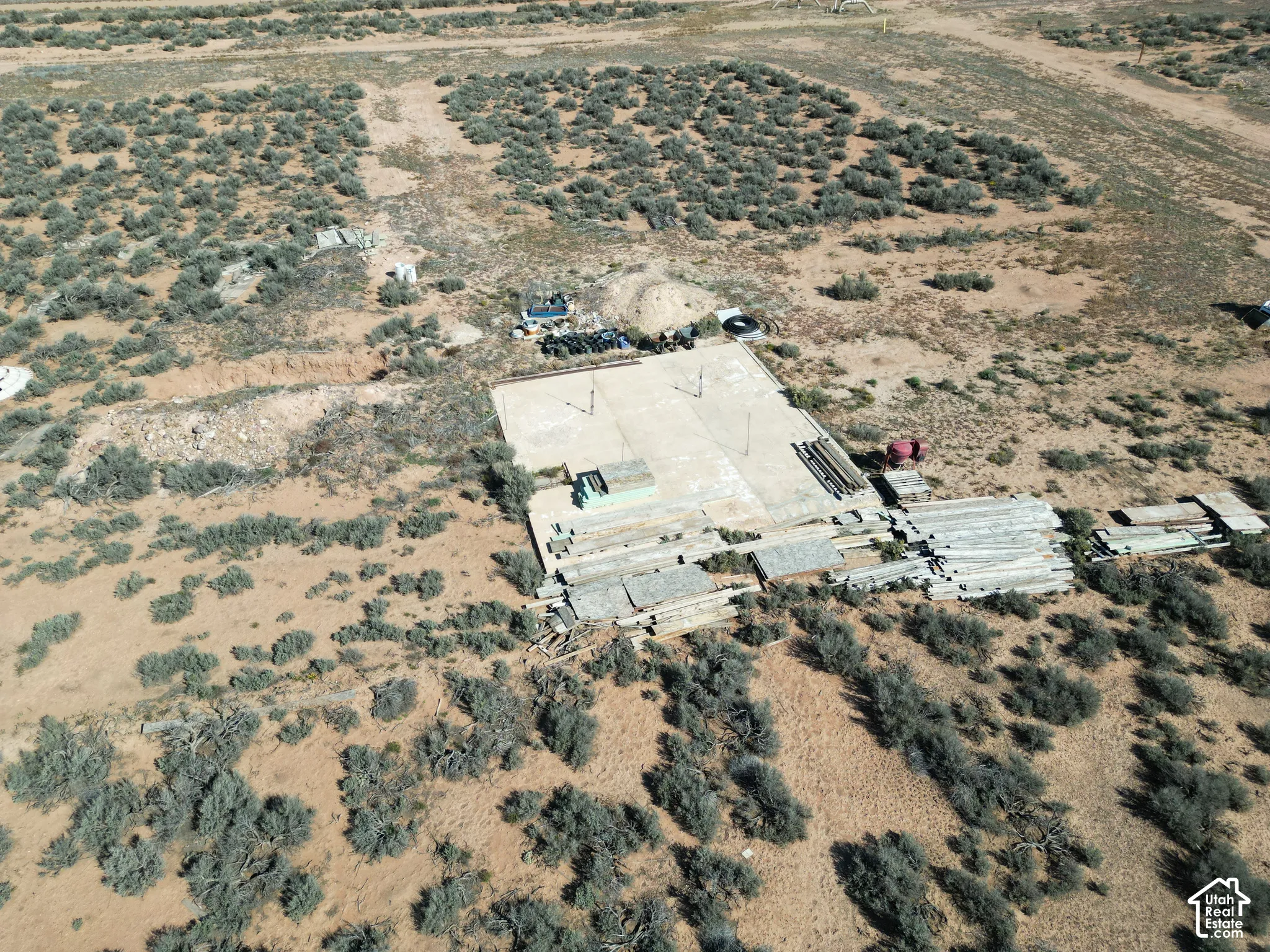 Expansive parcel of land featuring a concrete slab foundation