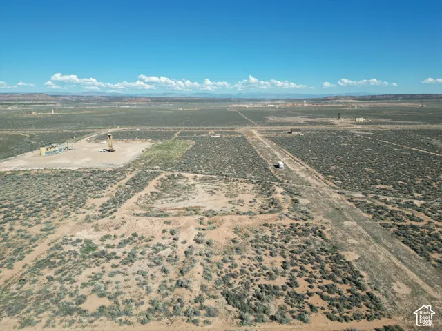 Expansive acreage featuring desert landscape, native vegetation, and distant mountain topography