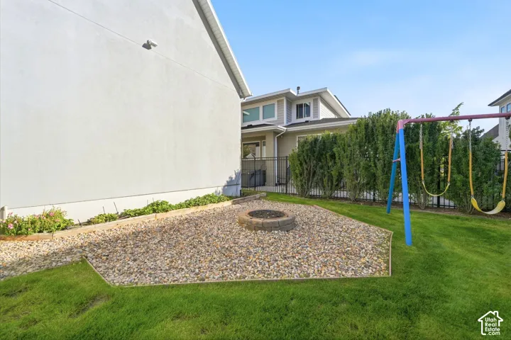 Built in firepit and included swingset