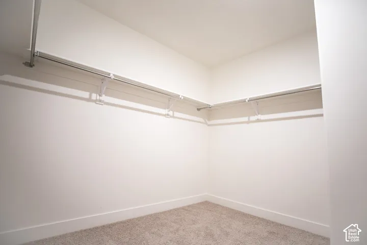 Large walk-in closet as part of primary suite.