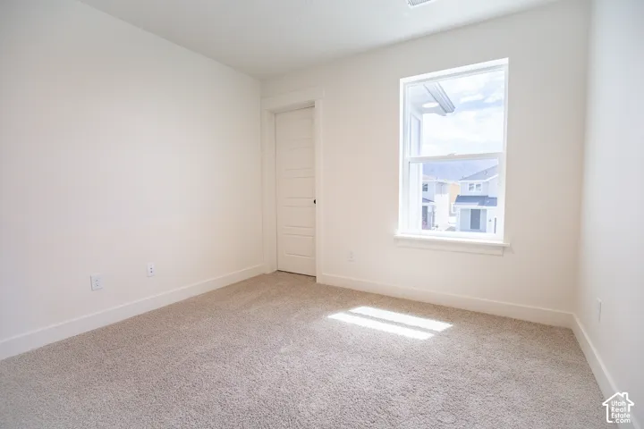 Bedroom #4 with walk-in closet.