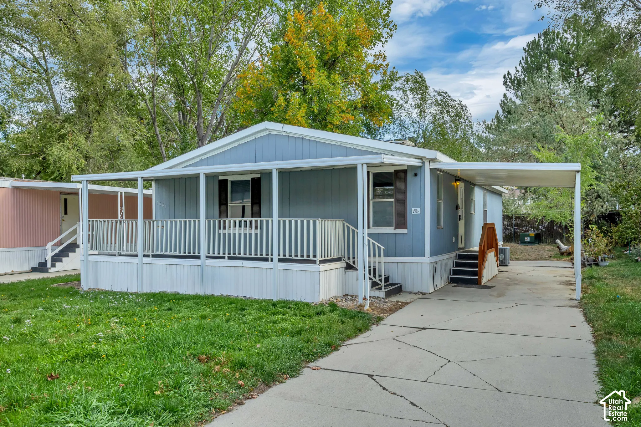 Light blue exterior siding with white trim