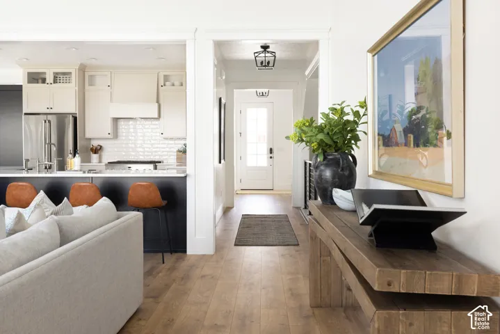 Open-concept layout with wood-finish flooring