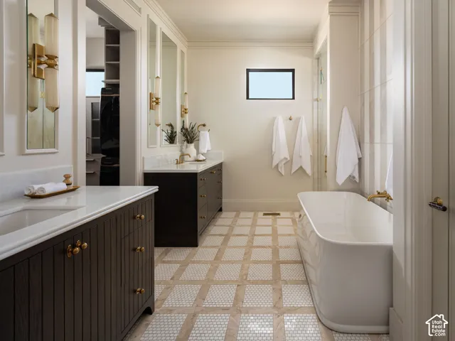 Dual vanities with integrated sinks and white countertops