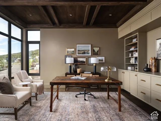 Wood beam ceiling with recessed lighting