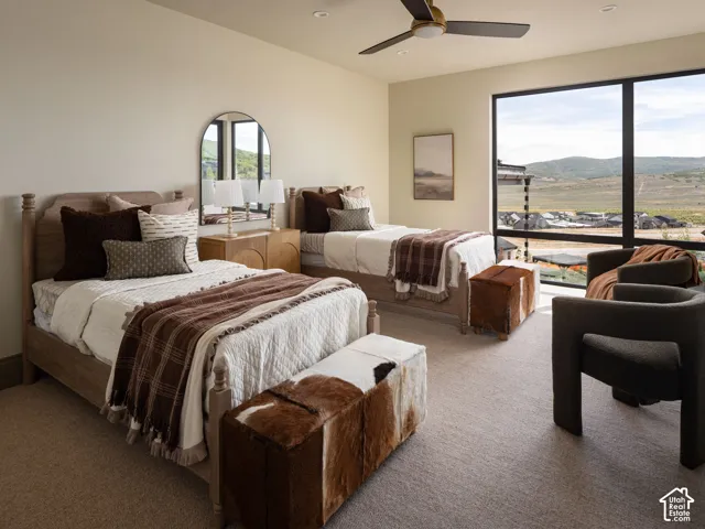 Recessed lighting, ceiling fan, and carpeted flooring