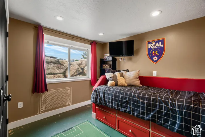 Recessed lighting and horizontal sliding window with natural stone landscape exposure