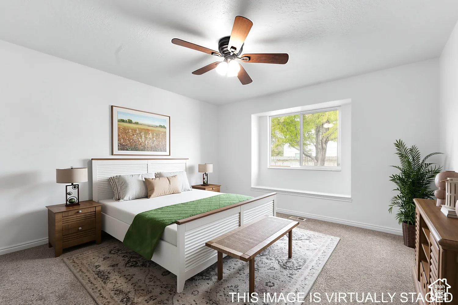 Neutral interior with a window seat, carpeted flooring, and a ceiling fan with integrated lighting