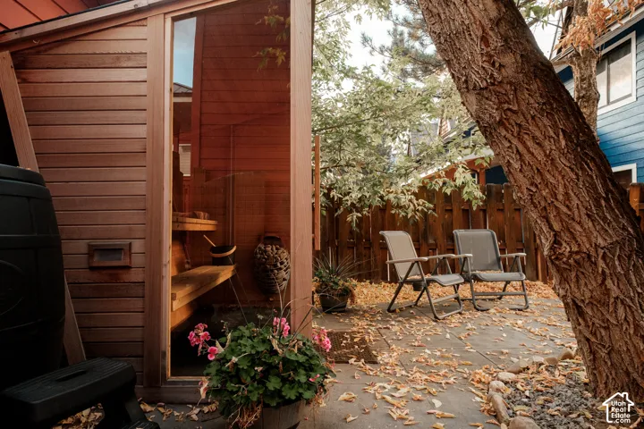 Outdoor sauna with wood paneling and interior bench seating