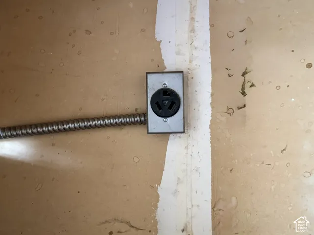 Surface-mounted 240-volt electrical outlet for EV charging