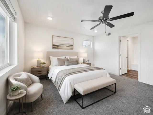 Primary Bedroom with en suite bath and ceiling fan