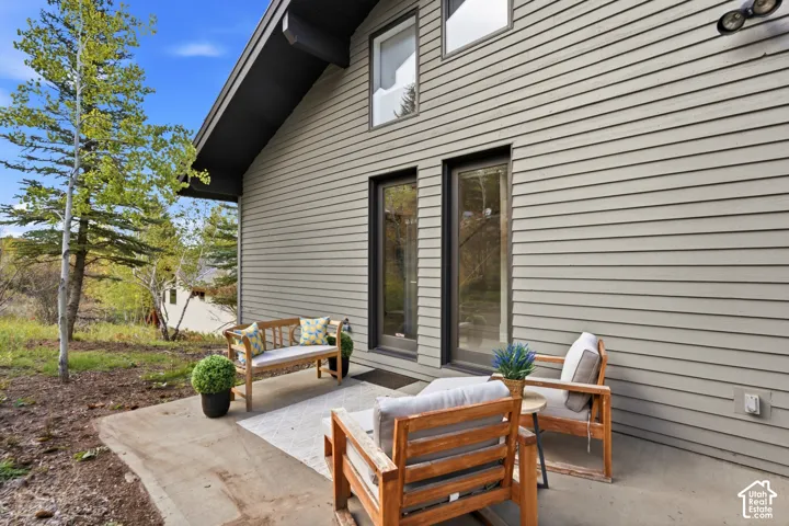 Exterior siding with a concrete patio