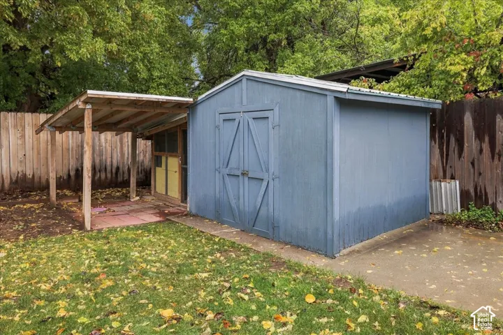 Detached storage shed & previous chicken coop.