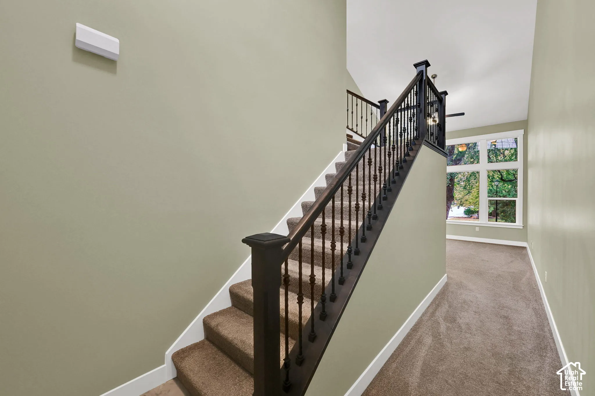 Entryway and staircase to upstairs.