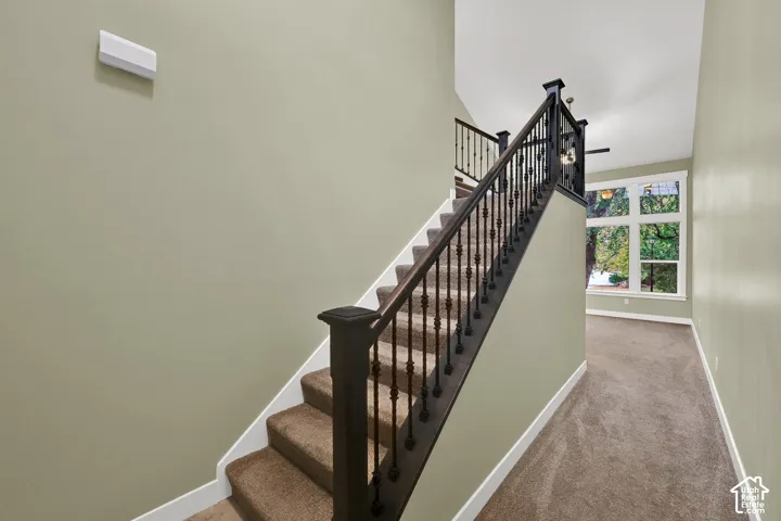 Entryway and staircase to upstairs.