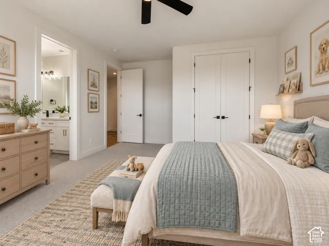 Bedroom 3 with jack-jill bathroom. Bedroom features wall-to-wall carpeting, double-door closet and a ceiling fan. Home is virtually staged