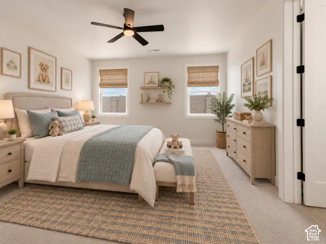 Bedroom 3 not staged. Jack-jill bathroom. Bedroom has neutral-toned carpeting, double-door closet, and ceiling fan fixture