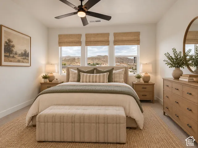 Bedroom 2 with jack-jill bathroom. Bedroom features wall-to-wall carpeting, double-door closet and a ceiling fan. Home is virtually staged