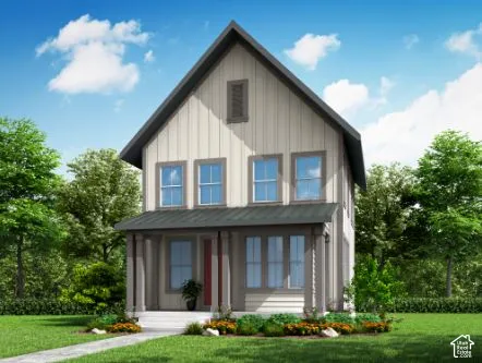 Two-story board-and-batten exterior with a covered front porch, dark metal roof accents, and vertical siding