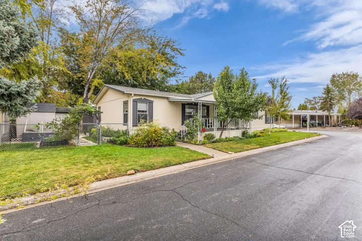 Located on a corner lot with amazing yard