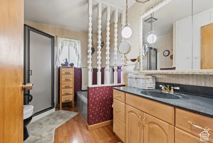 Wood-finish flooring throughout