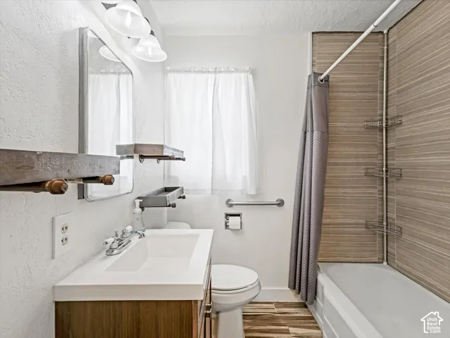 Recently Updated Bathroom with tile enclosure