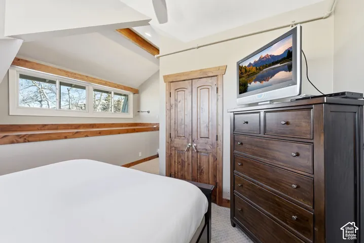 Vaulted ceiling with exposed wood beams