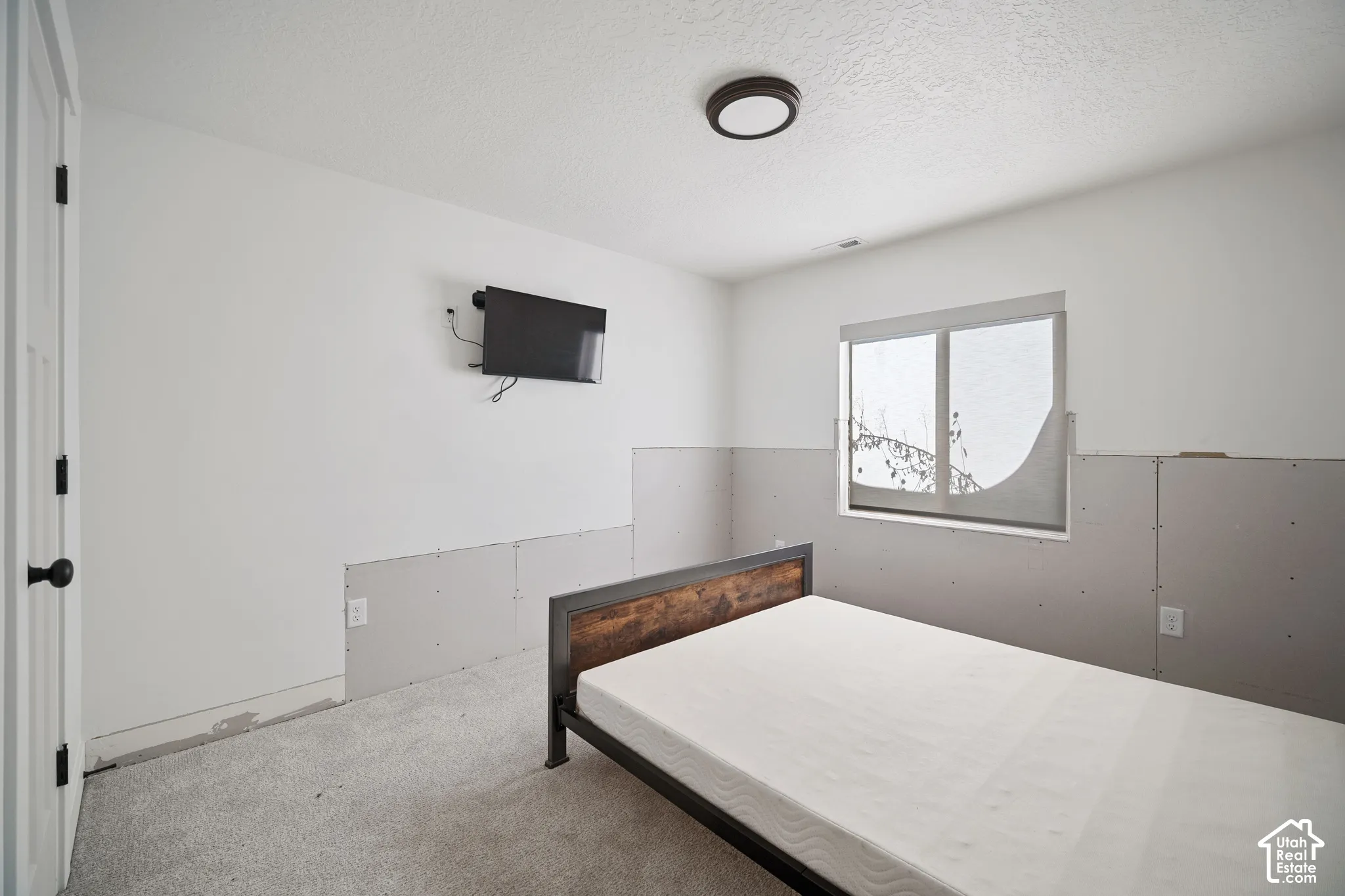 Basement bedroom walls are being worked on and will be done before closing.