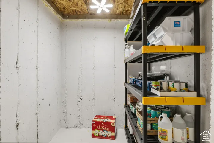 Enclosed cold storage area in basement