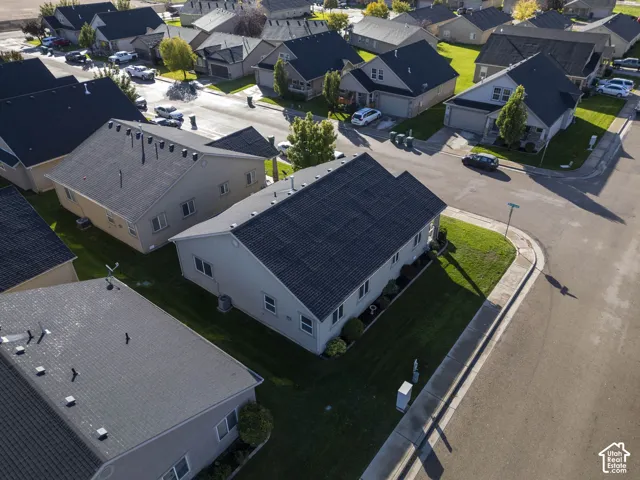 Corner-lot property,attached garage, and manicured lawn