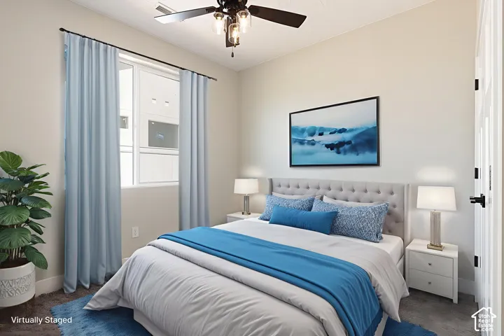 Bedroom featuring neutral wall paint, carpeting, a ceiling fan with integrated light fixture, and a window