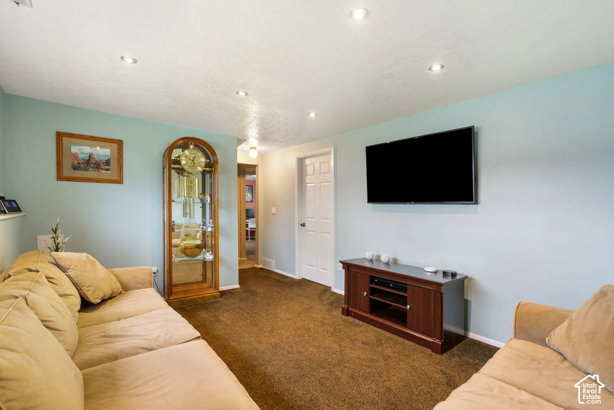 Recessed ceiling lighting, solid-core interior doors, and neutral wall tones
