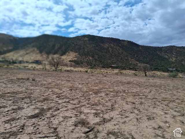Expansive parcel of land featuring natural topography and mountain terrain