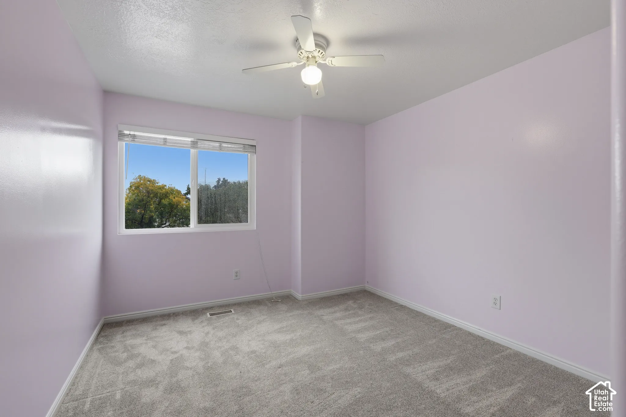 One of three upstairs bedrooms