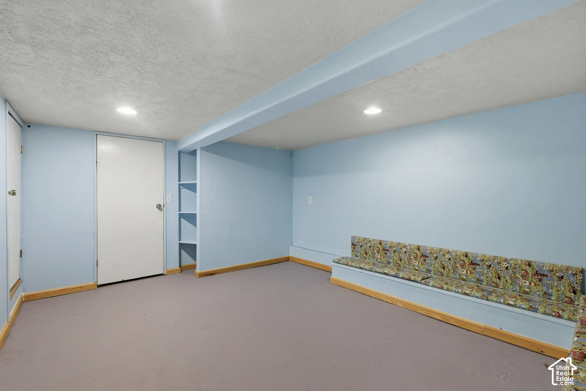 Lower level bonus play room with toy storage benches built-in.  This room is bonus sq ft and is not listed in the home sq ft.