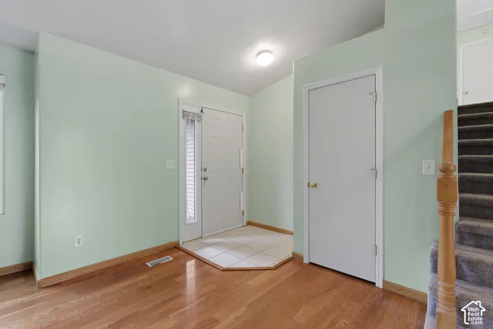 Welcoming entry with coat closet