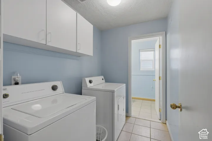Laundry room with included washer and dryer