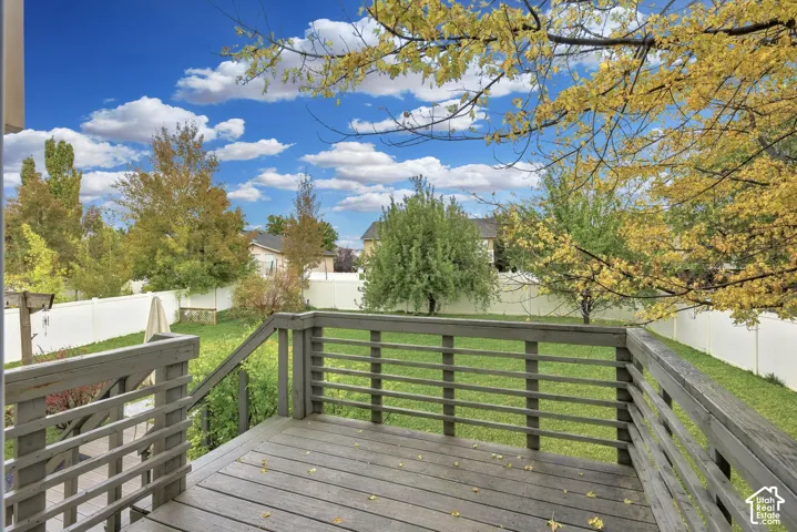 View from the deck of the fully fenced backyard