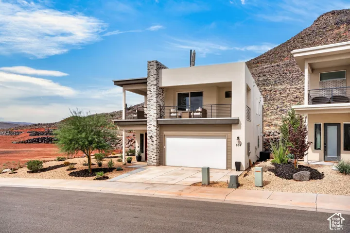 Modern exterior featuring a stucco fa