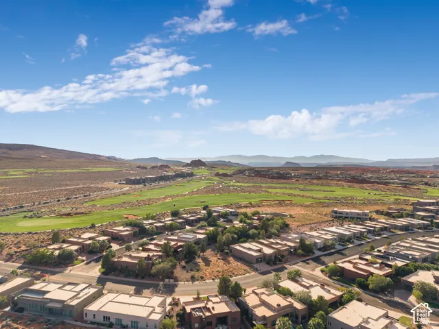 Residential neighborhood with golf course and mountain backdrop