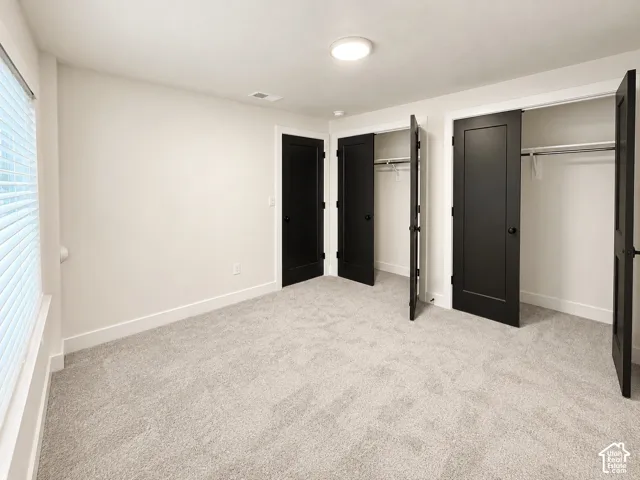 Basement bedroom with 2 proper closets.