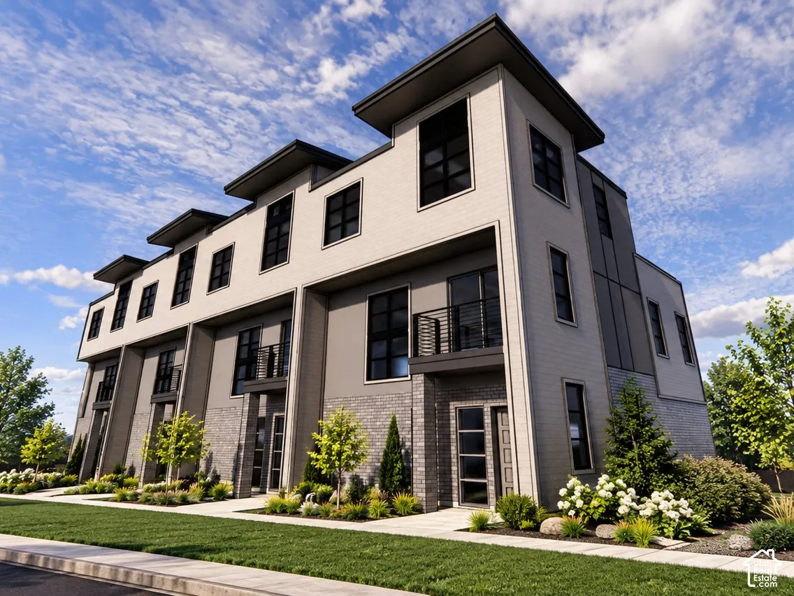 Multi-story exterior featuring a contemporary brick and stucco facade, flat roofline, integrated balconies, and expansive multi-pane windows